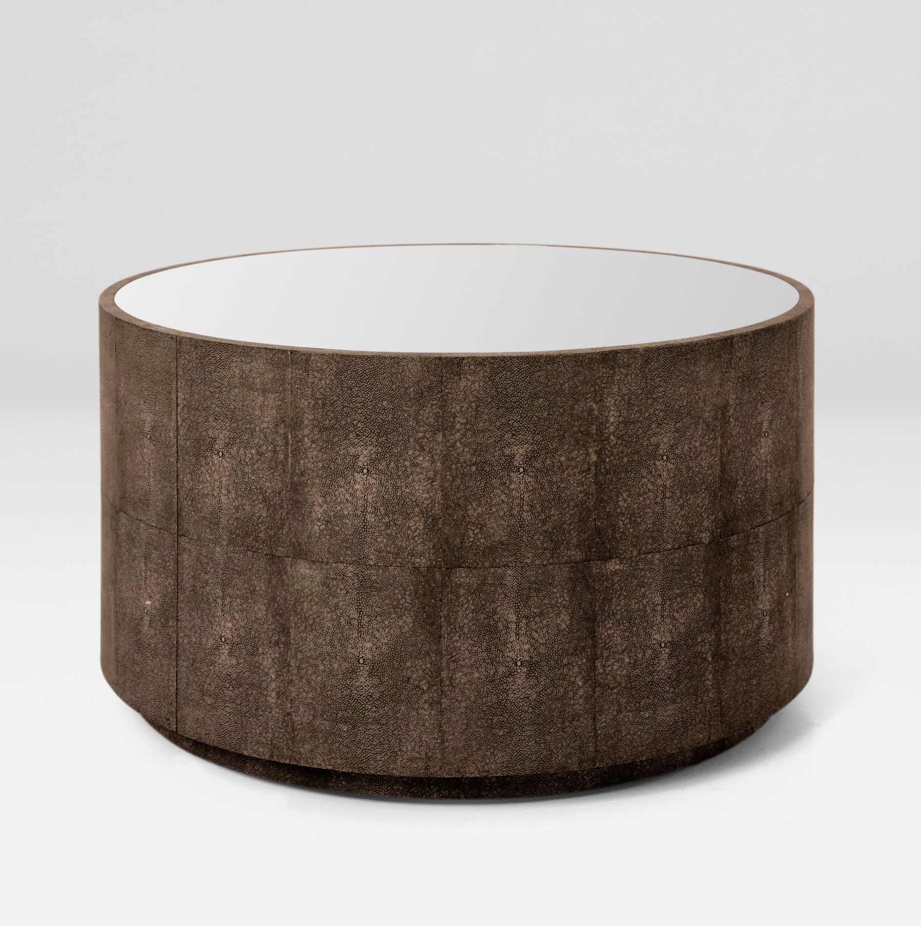 Brown faux shagreen coffee table with a round top and mirrored surface.