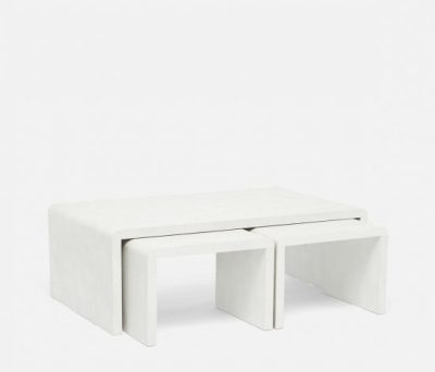 A white nesting coffee table with a faux shagreen finish, available in two colors: sand and cool gray.