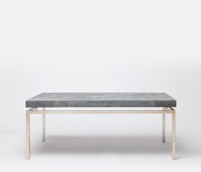 A modern coffee table with a faux shagreen top in grey, ivory, sand, mushroom or turquoise, displayed against a white background.