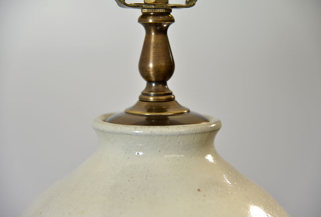 Discontinued item, limited stock available, 1 in Dallas, glazed ceramic egg lamp with thick wood base and cream linen shade.