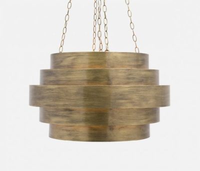 A large, metallic chandelier with a stacked circular design, featuring an aged silver finish and hanging from a chain.
