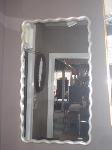 Large scalloped mirror with antique gold leaf art nouveau design, undulating moulding, and custom finishes and matching Benjamin Moore colors.