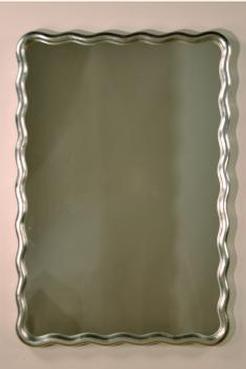 Large scalloped mirror with antique gold leaf art nouveau design from late 19th century Paris, featuring undulating moulding.