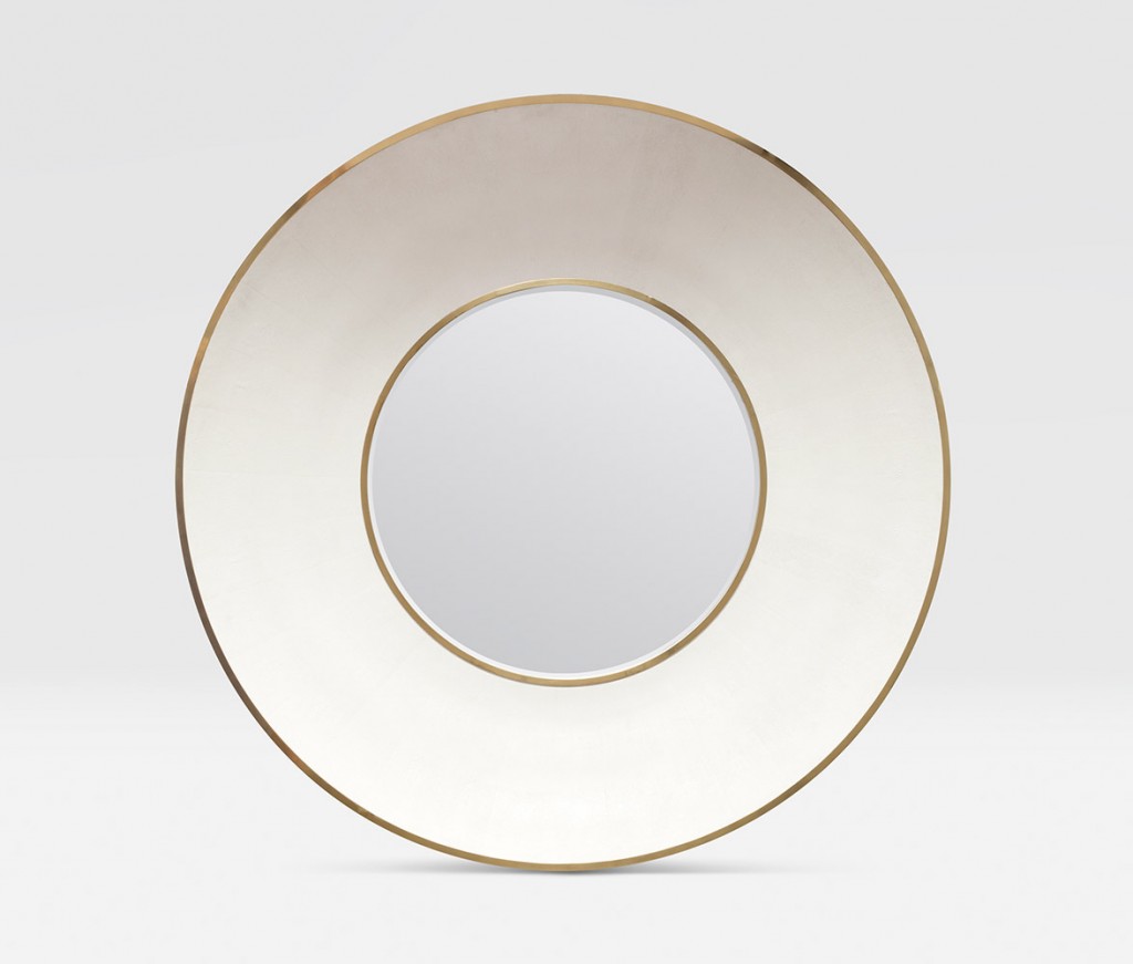 Round mirror with a gold trim in a snow faux shagreen design, set against a white background.