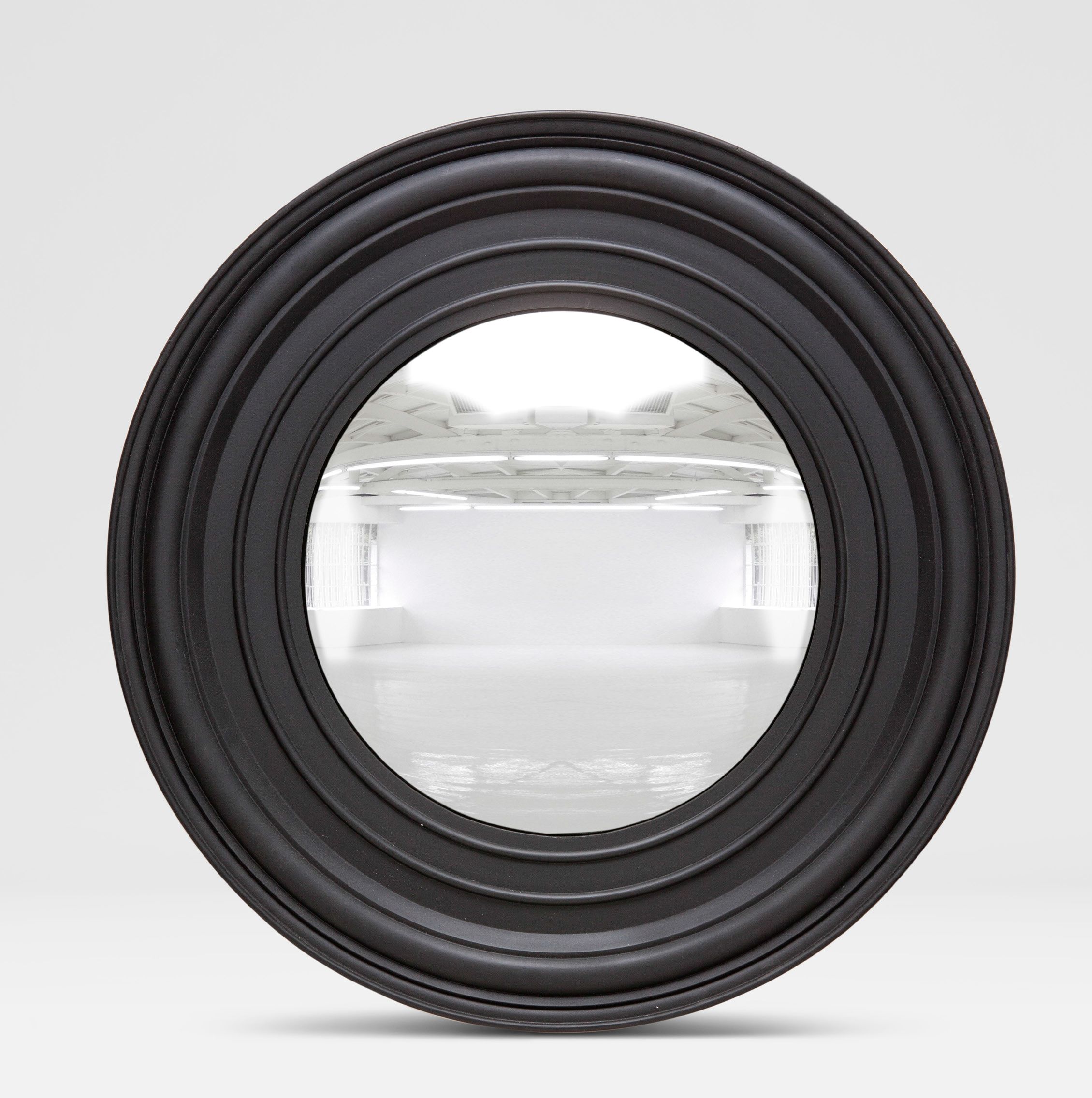 The image features a round convex mirror with a black frame and concentric circles, showcasing its design against a white background.