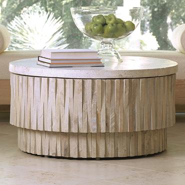 Round stone top coffee table with hand chiseled sculpted sides removable terrazzo top and four glides on base available as round stone