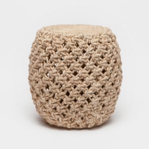 A woven, beige rope stool with a cylindrical shape and a knitted texture.