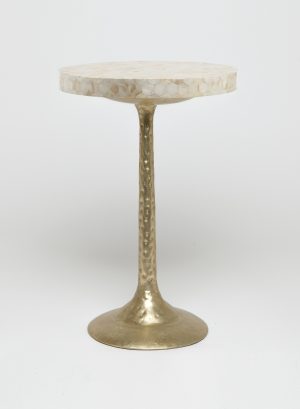 A small, round side table with a golden base and a marble top.