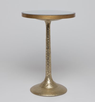 Small bistro side table with gold base and antiqued mirror top, presented in a close-up shot against a neutral background.