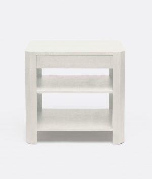 A large, modern nightstand with a light wood finish and two open shelves.