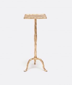 A gold-toned, twisted iron side table with a small rectangular top and a single vertical support, standing against a white background.